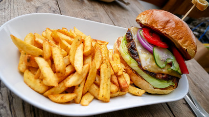Hamburger and fries on a table