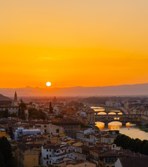 Sunset over the old town of Florence, Italy.