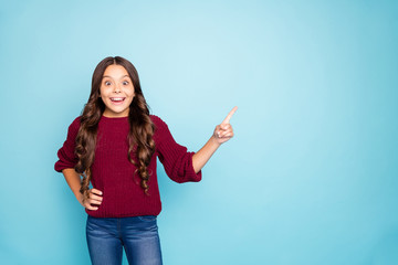 Portrait of her she nice attractive charming cheerful cheery glad wavy-haired girl pointing ad advert copy space isolated on bright vivid shine vibrant green turquoise color background