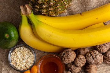 winter skin care. Homemade natural ingredients for a nourishing face mask on light background, top view.