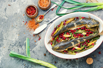 Baked fish with pomegranate