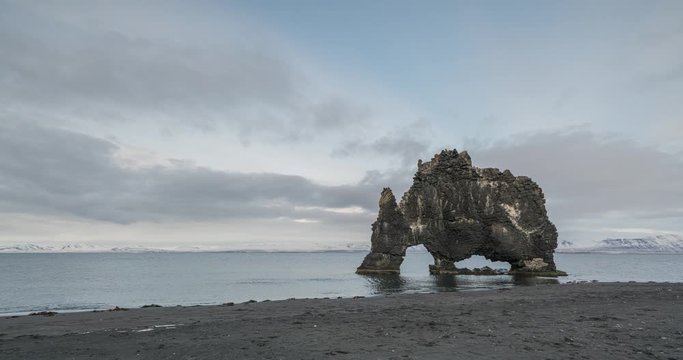 4K Timelapse of the Hvitserkur rock from the shore during sunset. Iceland in early spring