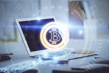 Multi exposure of blockchain theme hologram and table with computer background. Concept of bitcoin...