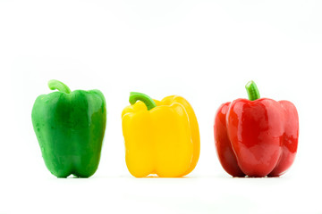 The sweet pepper, bell pepper Red Green Yellow on white background