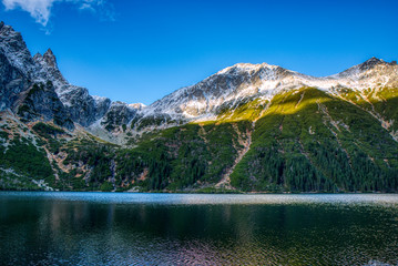 Beautiful view of lake with high mountains around , Poland Morskie Oko , High Tatras © Martin