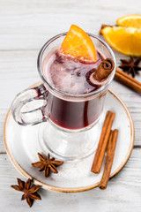 Mulled wine in a transparent glass goblet
