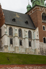Fototapeta na wymiar Golden letters on roof of Wawel castle in Krakow