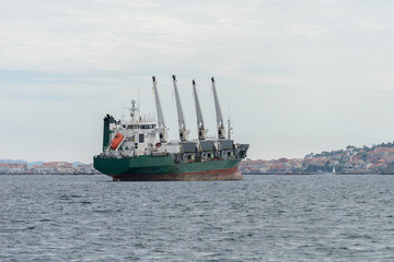 Fototapeta premium trawler with cranes on deck at sea