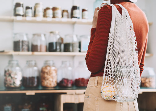 Young Woman In Zero Waste Shop Or Plastic Free Store.