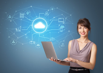 Young smiling person presenting office cloud technology concept