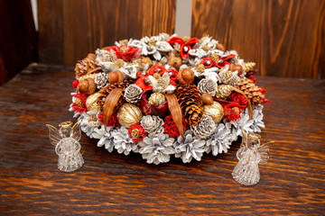 Christmas Wreath Lying On Wooden Background