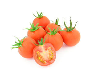 Red fresh tomatoes isolated on white background