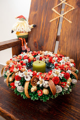 Christmas Wreath Lying On Wooden Background