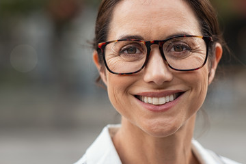 Successful mature woman wearing eyeglasses
