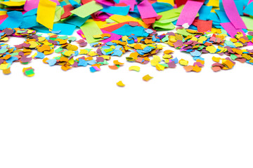 Fototapeta na wymiar Variously colorful confetti isolated on white with copyspace