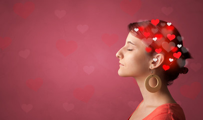 Head with full of love, red background and hearts