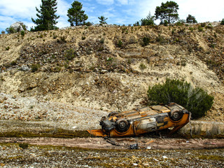 Burnt car in quarry