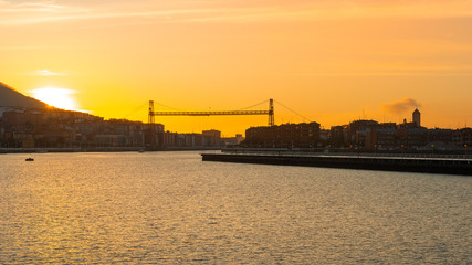 Panorama of Portugalete and Getxo with Hanging Bridge of Bizkaia at sunset, Basque Country, Spain	