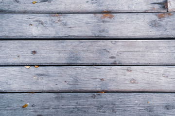 Natural narrow old piece of wood or slat texture, horizontal top view background.