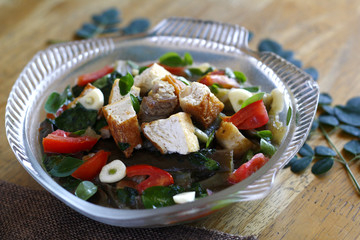 Filipino dish called Dinengdeng with tokwa and pork cooked in bagoong
