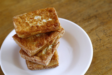 Stack of freshly fried tokwa or tofu