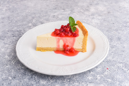 Modern cheese cake and red currant beeries