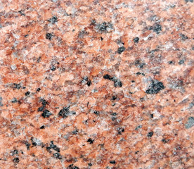 fine textured granite background in pink and black