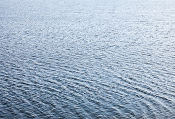Fototapeta na wymiar Water surface with ripples.