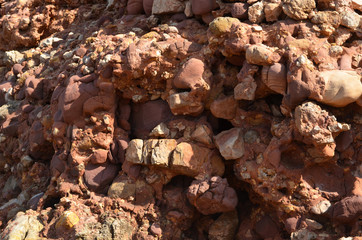 Stony texture with rocks and stones. Abstract and chaotic appearance.