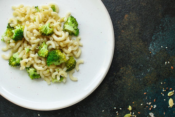 pasta broccoli, vegetarian dish (main course with vegetables Cavatappi, Elbow) menu concept. food background. top view. copy space