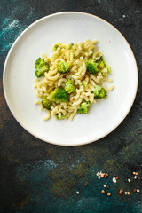 pasta broccoli, vegetarian dish (main course with vegetables Cavatappi, Elbow) menu concept. food background. top view. copy space