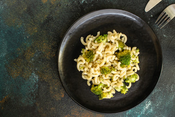 pasta broccoli, vegetarian dish (main course with vegetables Cavatappi, Elbow) menu concept. food background. top view. copy space