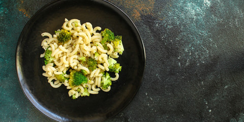 pasta broccoli, vegetarian dish (main course with vegetables Cavatappi, Elbow) menu concept. food background. top view. copy space