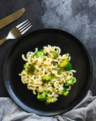 pasta broccoli, vegetarian dish (main course with vegetables Cavatappi, Elbow) menu concept. food background. top view. copy space