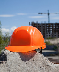 Plastic hard hat in the construction site