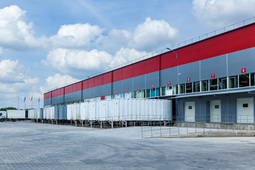 Obraz premium The modern truck is standing on a territory of the transport warehouses