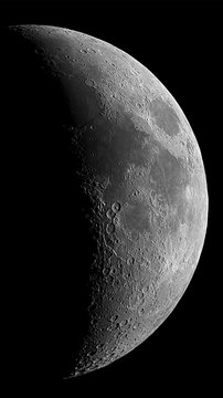Waxing crescent Moon phase, isolated in the black space, in this phase there are some good craters.
