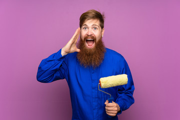 Painter man with long beard over isolated purple background shouting with mouth wide open