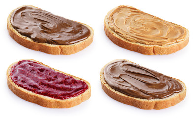 Toasts with chocolate butter, peanut butter and  berry jam isolated on white background.