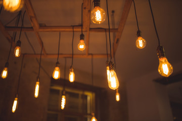 View on hanging wintage light bulbs, edison style light