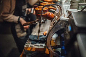 Fototapeta na wymiar Professional coffee machine in coffee shop, close up view.