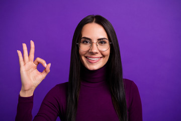 Close up photo of cheerful positive attractive woman smile toothy showing ok sign isolated bright color purple background