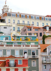 Jumble of many brightly coloured buildings in Lisbon, Portugal