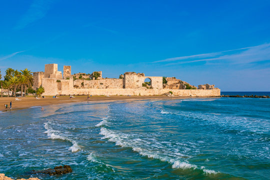 Historical, Ancient Kizkalesi, Kiz Kalesi or Maiden's Castle with Korykos Ruins in Mersin Beach from Turkey near Mediterranean Sea.