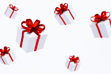 White gift box with red ribbon floating on white background 3d rendering. 3d illustration minimal style, celebration christmas and new year sale concept.