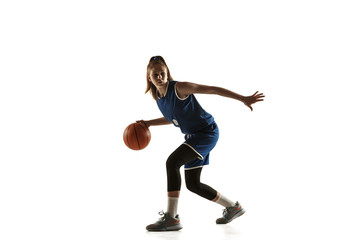Young caucasian female basketball player of team in action, motion in run isolated on white background. Concept of sport, movement, energy and dynamic, healthy lifestyle. Training, practicing.