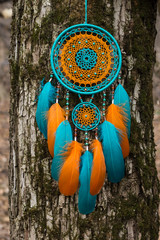 Handmade dream catcher with feathers threads and beads rope hanging