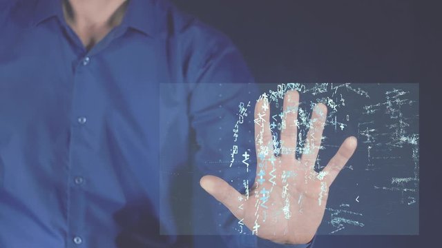 A person touches a futuristic screen with his hand on which a digital lock of protection and safety appears. Work with modern technologies.