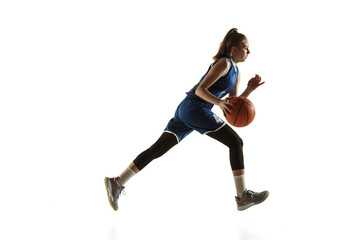 Young caucasian female basketball player of team in action, motion in run isolated on white...