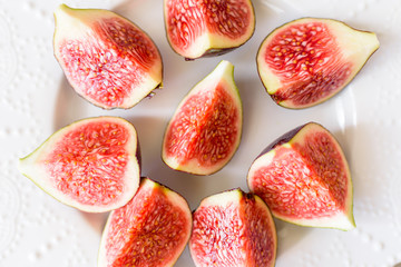 chopped figs on a white ceramic plate
